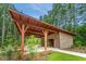 Brick poolside cabana with wooden beams and covered patio at 2593 Seaton Street, Summerville, SC 29486