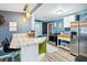 Charming kitchen with stainless steel appliances and island at 924 W Oceanview Rd, Charleston, SC 29412