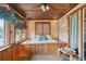 Serene sunroom with built in daybed and water views at 924 W Oceanview Rd, Charleston, SC 29412