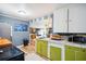 Kitchen with stainless steel sink and green cabinets at 924 W Oceanview Rd, Charleston, SC 29412
