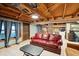 Finished basement with red leather couch and kitchenette at 924 W Oceanview Rd, Charleston, SC 29412