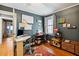 Home office with desk, window, and hardwood floors at 924 W Oceanview Rd, Charleston, SC 29412