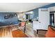 Open living room with kitchen view and wood floors at 924 W Oceanview Rd, Charleston, SC 29412
