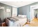 Serene bedroom with a queen bed and gray walls at 924 W Oceanview Rd, Charleston, SC 29412