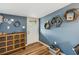 Bright hallway with rustic dresser and access to exterior at 924 W Oceanview Rd, Charleston, SC 29412