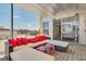 Spacious rooftop patio with sectional seating and city views at 487 King St # 202 Penthouse, Charleston, SC 29403