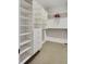 Spacious walk-in closet with ample shelving and hanging space at 487 King St # 202 Penthouse, Charleston, SC 29403