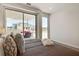 Serene bedroom with king-size bed and access to a balcony at 487 King St # 202 Penthouse, Charleston, SC 29403