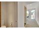 Small half bathroom with toilet and sink at 487 King St # 202 Penthouse, Charleston, SC 29403