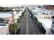 Aerial view of a city street lined with palm trees and buildings at 487 King St # 202 Penthouse, Charleston, SC 29403