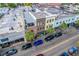 Aerial view of a commercial building in a vibrant city setting at 487 King St # 202 Penthouse, Charleston, SC 29403