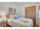 Cozy bedroom with a comfortable bed and plenty of pillows at 487 King St # 202 Penthouse, Charleston, SC 29403