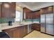 Modern kitchen with stainless steel appliances and white countertops at 487 King St # 202 Penthouse, Charleston, SC 29403