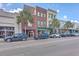 Street view of commercial building and parked cars at 487 King St # 202 Penthouse, Charleston, SC 29403