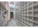 Building entrance with glass block wall and metal door at 487 King St # 202 Penthouse, Charleston, SC 29403