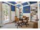 Bright library with built-in shelving, fireplace, and window seat at 2981 Deer Point Dr, Seabrook Island, SC 29455