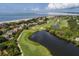 Golf course with scenic water features and luxury homes nearby at 2981 Deer Point Dr, Seabrook Island, SC 29455