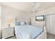 Bedroom with a full-size bed, white dresser, and ceiling fan at 5559 Colonial Chatsworth Cir, North Charleston, SC 29418