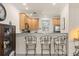 Kitchen with granite countertop and breakfast bar at 5559 Colonial Chatsworth Cir, North Charleston, SC 29418