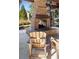 Brick fireplace and seating area in an outdoor pavilion at 5559 Colonial Chatsworth Cir, North Charleston, SC 29418