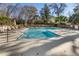 Inviting community pool with ample deck space for lounging at 5559 Colonial Chatsworth Cir, North Charleston, SC 29418