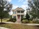 Two story home with red door and landscaped yard at 3699 Shutesbury St, Mount Pleasant, SC 29466
