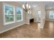 Bright dining room with hardwood floors and built-in cabinetry at 3699 Shutesbury St, Mount Pleasant, SC 29466
