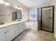 Elegant bathroom boasts double vanity, soaking tub, and walk-in shower at 3699 Shutesbury St, Mount Pleasant, SC 29466