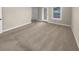 Large bedroom with neutral carpeting and access to another bedroom at 3699 Shutesbury St, Mount Pleasant, SC 29466