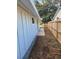 Side yard with gravel landscaping and fence at 2407 Lantern St, Charleston, SC 29414