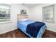 Charming bedroom with hardwood floors and a blue bedspread at 2736 Shadow Ln, North Charleston, SC 29406