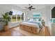 Main bedroom with wicker bed frame and calming coastal decor at 3238 Plow Ground Rd, Johns Island, SC 29455