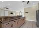 Kitchen features stainless steel countertops and island with seating at 3238 Plow Ground Rd, Johns Island, SC 29455