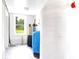 Unfinished basement with water softener and filtration system at 3238 Plow Ground Rd, Johns Island, SC 29455