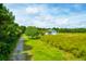 Property features a house on a large lot with lush greenery at 3238 Plow Ground Rd, Johns Island, SC 29455