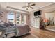 Bedroom with lake view, dresser, and hardwood floors at 586 Eastern Isle Ave, Summerville, SC 29486