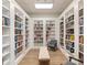 Quiet library with abundant bookshelves and seating at 586 Eastern Isle Ave, Summerville, SC 29486