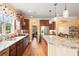 View of kitchen showcasing the island and hardwood floors at 586 Eastern Isle Ave, Summerville, SC 29486