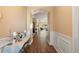 Bright entryway with hardwood floors and decorative table at 586 Eastern Isle Ave, Summerville, SC 29486