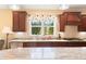 Kitchen boasts granite counters and modern sink at 586 Eastern Isle Ave, Summerville, SC 29486