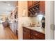 Kitchen wet bar with wine rack, sink, and coffee maker at 586 Eastern Isle Ave, Summerville, SC 29486