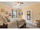 Cozy bedroom with a comfortable bed and a mirrored closet at 586 Eastern Isle Ave, Summerville, SC 29486