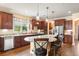 Large kitchen island with granite countertop and seating at 586 Eastern Isle Ave, Summerville, SC 29486