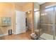 Main bathroom with walk-in shower, tile flooring, and toilet at 586 Eastern Isle Ave, Summerville, SC 29486