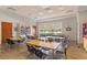 Bright classroom with multiple tables and chairs at 586 Eastern Isle Ave, Summerville, SC 29486