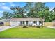 Charming ranch home with freshly painted exterior and fenced yard at 120 Blossom St, Goose Creek, SC 29445