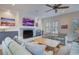 Spacious living room with light blue sofas and a rustic coffee table at 3703 Hartnett Blvd, Isle of Palms, SC 29451