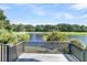 Deck overlooking a tranquil lake and golf course at 4910 Green Dolphin Way, Kiawah Island, SC 29455