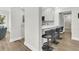 Kitchen with breakfast bar and view to living room at 4910 Green Dolphin Way, Kiawah Island, SC 29455