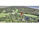 Wide aerial view of home and surrounding golf course at 4910 Green Dolphin Way, Kiawah Island, SC 29455